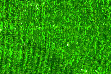 Shiny green background from light to dark, emerald glitter texture festive background. Feast of Saint Patrick.の写真素材