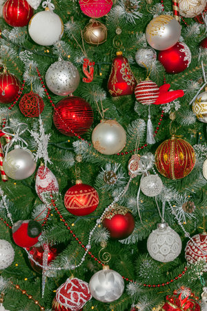 Christmas home decor, balls hanging on the tree. New Year card. Background.の写真素材
