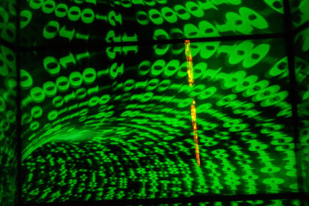 Green binary numbers on black background, zeros and ones, background and ITの写真素材