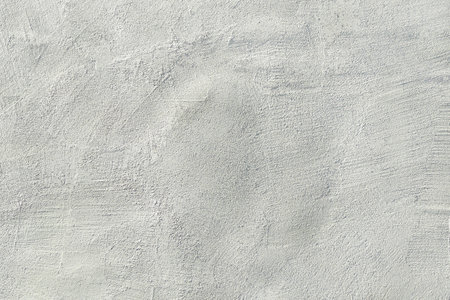 Texture, wall, concrete, plaster, it can be used as a background. Fragment of a wall with scratches and cracksの写真素材