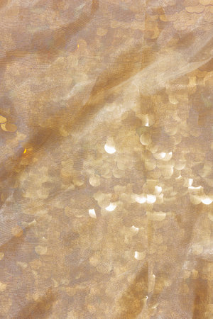 Gold sequin background with white silk folds on top. For your design for Christmas or special day.の写真素材