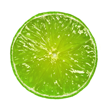 Slice, lime wedge on white background isolated. Close up shot. Bright green citrus slice. Restaurant menu for holidays and christmas.の写真素材
