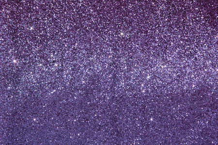 Beautiful elegant shiny purple luxury fabric texture with glitter sequins, shiny lilac background.の写真素材