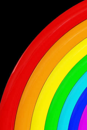 A rainbow of seven colors on a black backgroundの写真素材