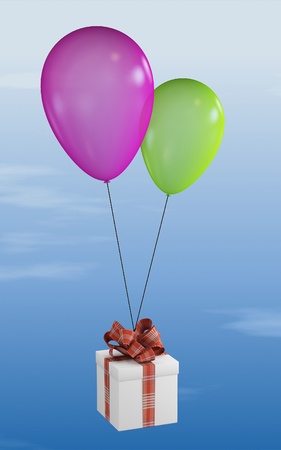 Gift, will draw a red ribbon in the sky on two balloonsの写真素材