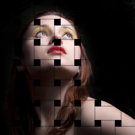 Portrait of a young woman, isolated on a black background with the effect of interlacingの写真素材