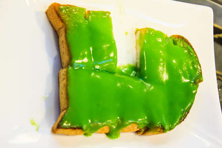 Toast topped with custard の写真素材