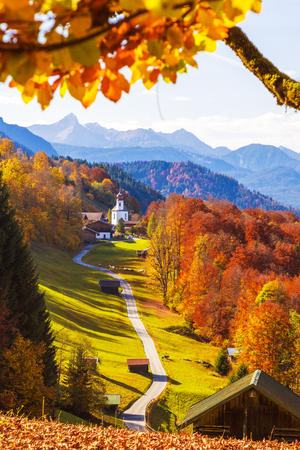The iconic Wamberg Church, with Mount Waxenstein on the background. Wamberg, Garmisch Partenkirchen, Bayern, Germanyの写真素材