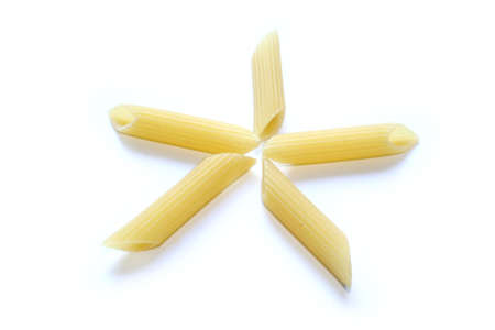 italian pasta star composition penne isolatedの写真素材