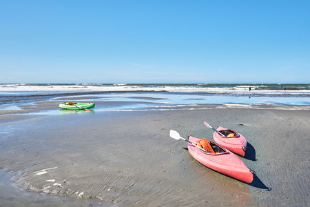 Canoes on Newport Sands, Newport Bay, Pembrokeshire, Dyfed, Wales, UKの写真素材
