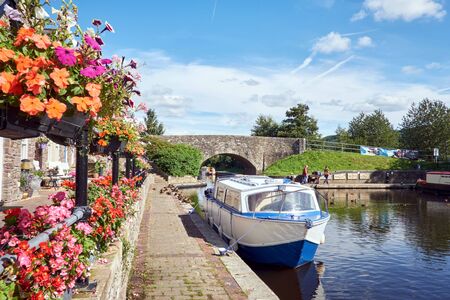 A boat on Brecon canal basin Powys Wales UK