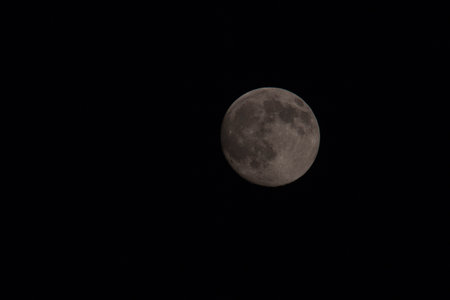 Moon shot during a dark nightの写真素材