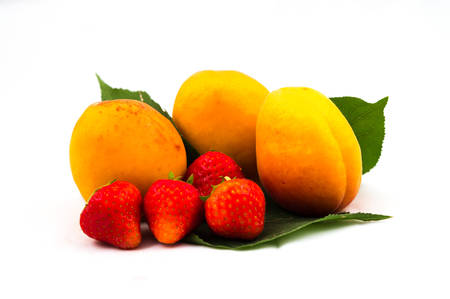 strawberries and apricots closeupの写真素材