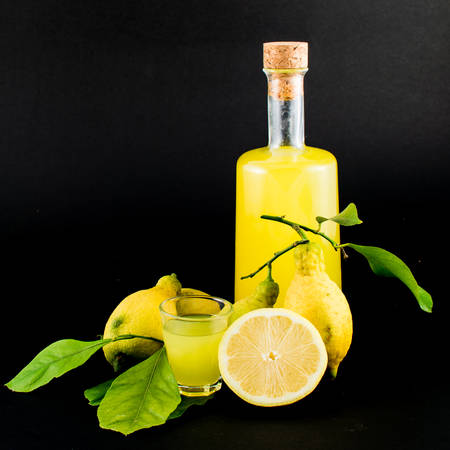 "Limoncello" is the traditional liqueur distilled from the peel of lemons (called sfusato amalfitano) produced in all the Coast of Amalfi until Sorrento. It's a natural liqueur, with special properties, a unique taste, perfumed, obtained by an ancient andの写真素材