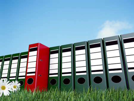 office folders on green grassの写真素材