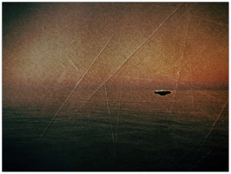 ufo over the sea in old grunge photo