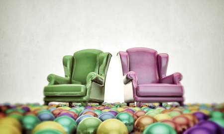 armchairs in old pictures with colored balls aroundの写真素材