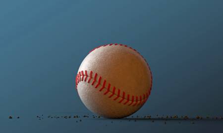 baseball ball isolated on blue backgroundの写真素材