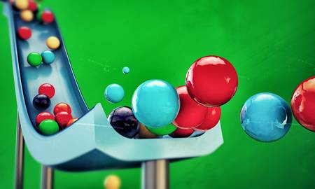 gumballs sliding down isolated on green background
