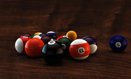 pool balls on dark wooden table