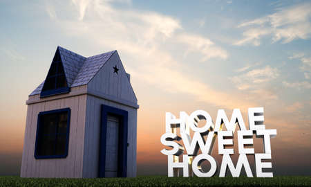 small wooden house on green grassの写真素材