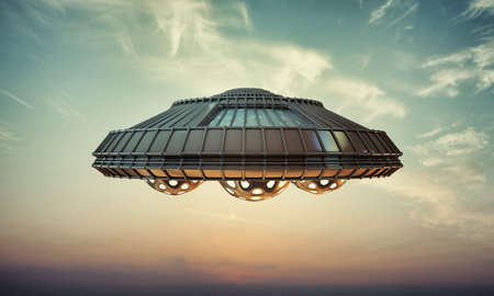 ufo spaceship flying in the skyの写真素材