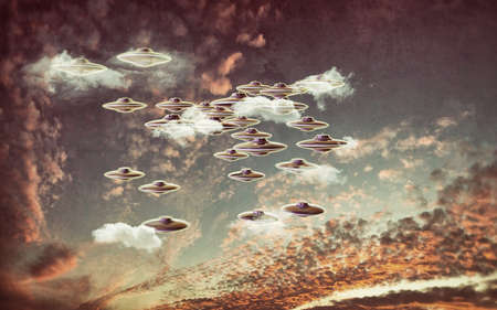 unidentified flying objects isolated on sky backgroundの写真素材