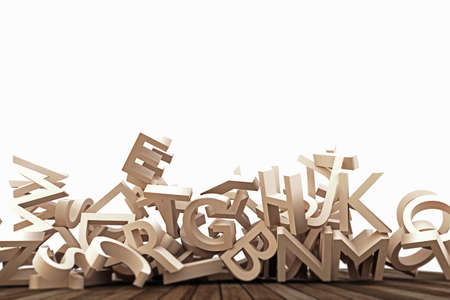 falling letters on wooden floorの写真素材