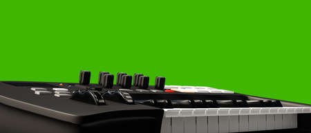 3d illustration of a mini keyboard isolated on green background for cutoutの写真素材