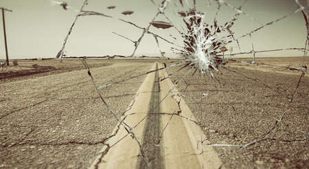 3d illustration of an ufo over a desert road の写真素材