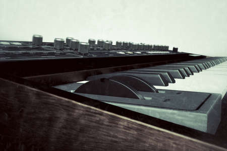 old musical sinth keyboard isolated on white backgroud 3d illustrationの写真素材