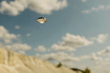 unidentified flying object floating in the sky 3d illustrationの写真素材