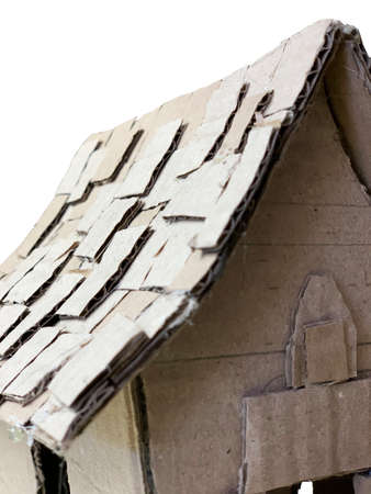 cardboard house isolated on white backgroundの写真素材