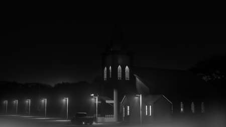 old church in a huge empty street of a small town 3d illustrationの写真素材