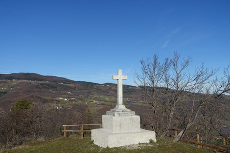 cross above montecreto overlooking the panoramaの写真素材