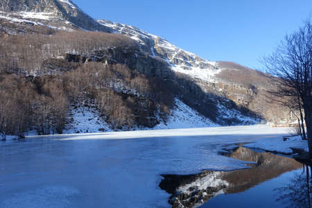 holy lake in the frignano park in winterの写真素材