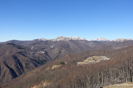 alto frignano regional park with snow-capped peaks of the cimoneの写真素材