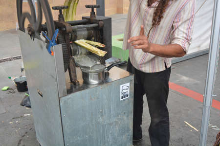 preparation of an artisanal aperitif from sugar caneの写真素材