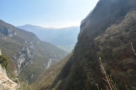 view of the valley from the sanctuary of the madonna della corona in ferrara di monte baldo lake gardaの写真素材