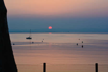 sunset on lake gardaの写真素材