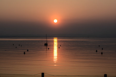sunset on lake gardaの写真素材