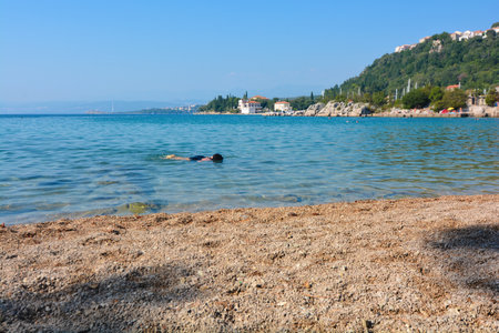 snorkeling in the clear waters of krkの写真素材