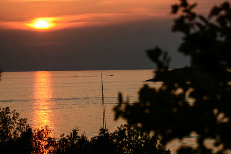 sunset over the adriatic sea in the coasts of istriaの写真素材