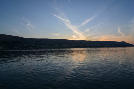 sunset of the city of pag capital of the island of pagの写真素材
