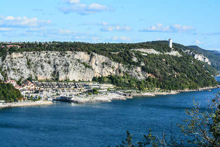 constructions under the cliff in Baia Sistiana Triesteの写真素材