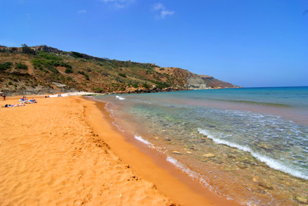 Ramla Bay beach in Gozo reddish sandの写真素材