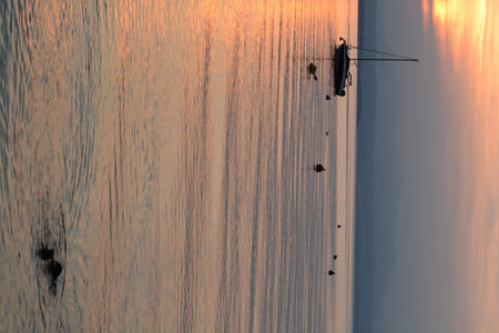 sunset with clouds on lake gardaの写真素材