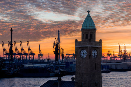 View of the level tower at LandungsbrÃ¼cken and the port of Hamburg during sunset, horizontalの写真素材