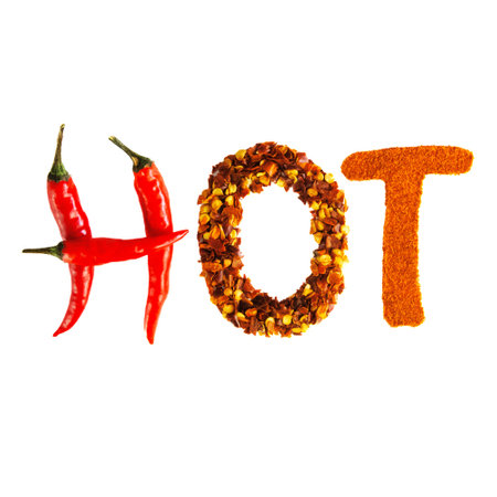 Lettering âHOTâ made from chili peppers, chili flakes and chili powder, white background, 1:1の写真素材