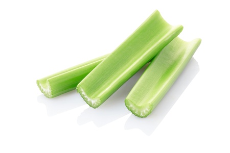 Celery sticks isolated on white の写真素材